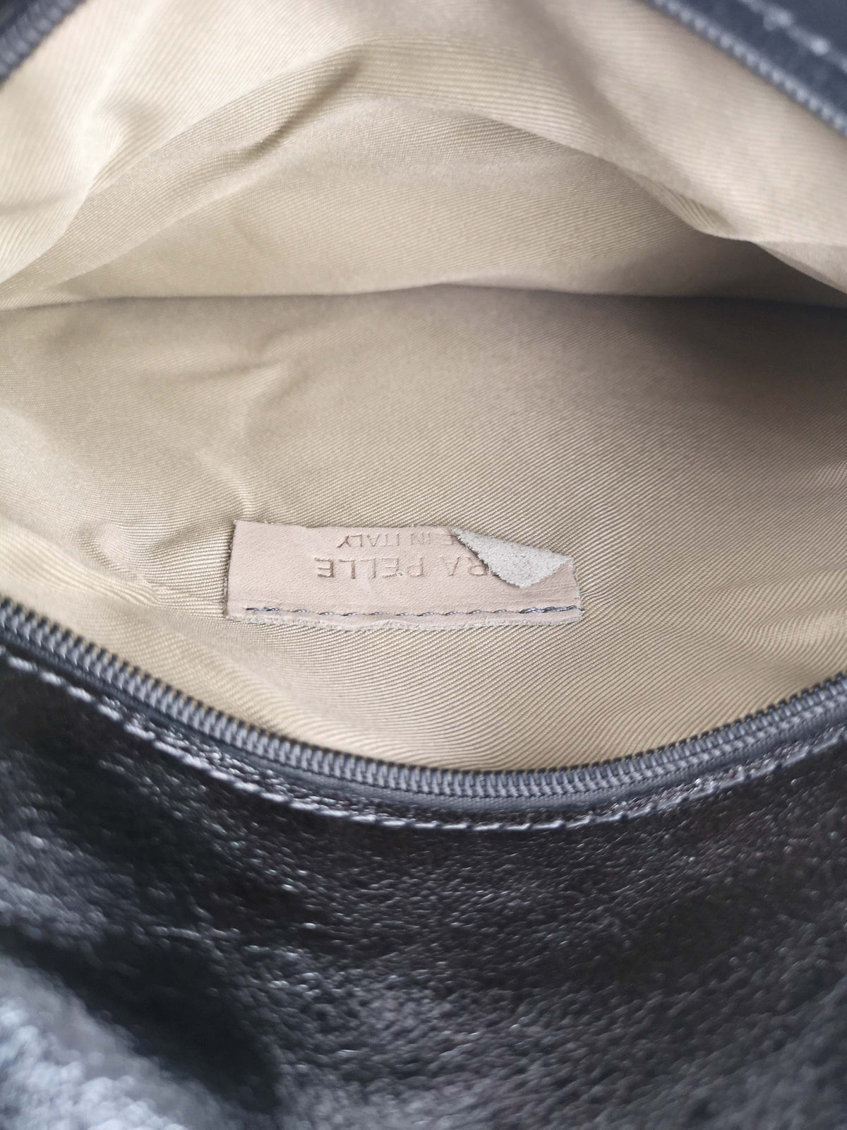 Vera Pelle Clutch